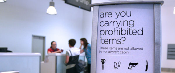 Airport check-in prohibited items sign